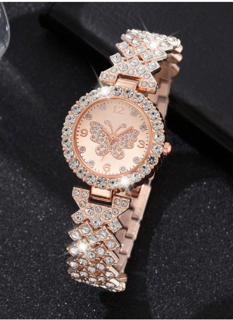 Women's Watch and Bracelet Set Made of Rose Gold Stainless Steel Decorated with Rhinestones in a Butterfly Design and Features a Round Frame and a Watch Bracelet with a Unique and Distinctive Design Suitable for Daily Wear Parties and Holidays
