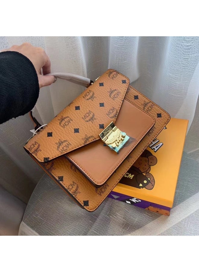 MCM Brown Monogrammed Flap Crossbody Bag with Top Handle and Gold-tone Lock
