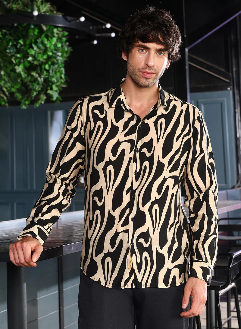 Campus Sutra Men Contrast-Flowing Imprint Shirt | Spread Collar, Long Button-Cuff Sleeves | Button , Curved Hem | Abstract Print Creased | Woven Fabric For Casual & Daily Wear | Buff Beige & Midnight Black