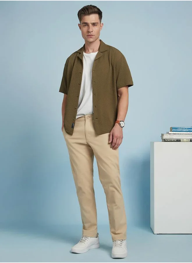 دينيس لينغو Trendy Beige Straight Fit Chinos for Men featuring subtle back pocket detailing, crafted from a breathable and stretchable cotton-lycra blend for daily comfort.