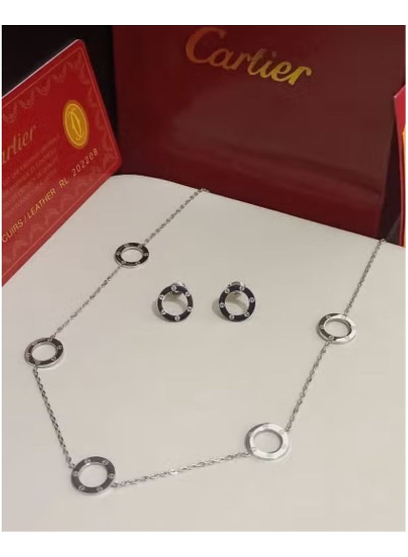 CA Silver necklace and earring set with accessories and warranty card