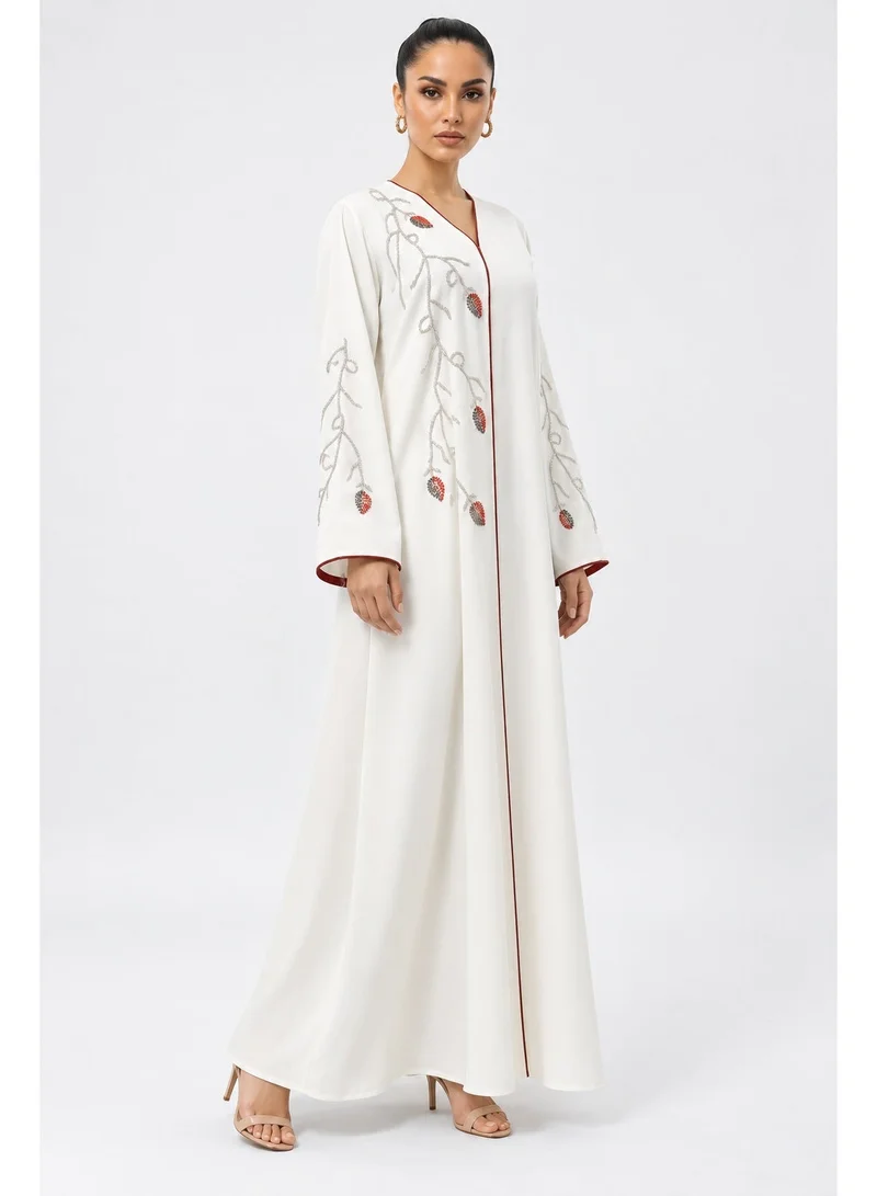 Aara Elegant Ivory White Women's Abaya with Navy Blue Embroidery and Decorative Beadwork