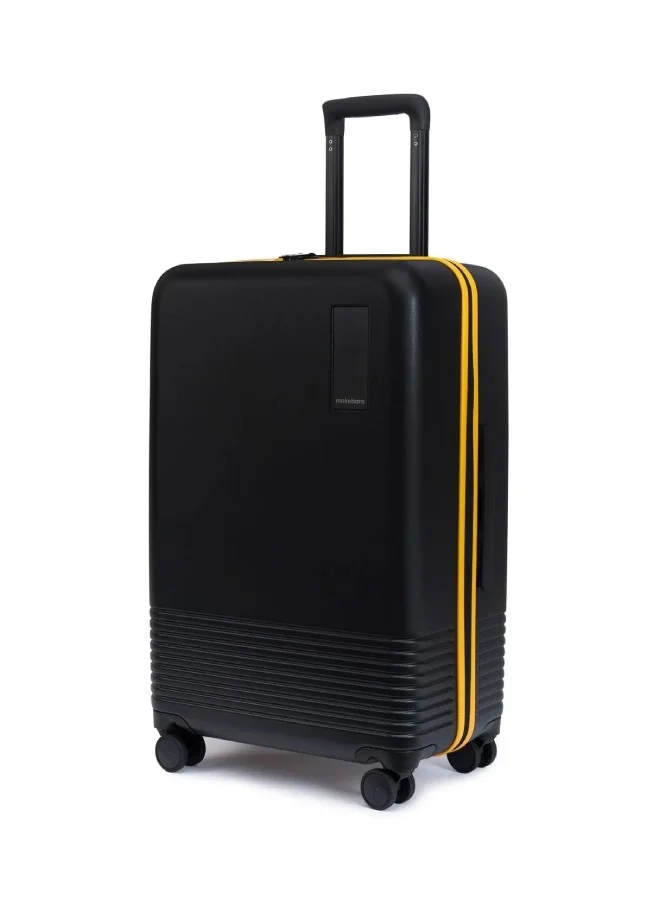 Mokobara Iconic Range The Check-in Luggage Medium Size German Makrolon Poly-Carbonate Hard Sided 8 Hinomoto Wheels Suitcase Trolley - Hinomoto Wheels, Black-Crypto Sunray (Limited Edition)