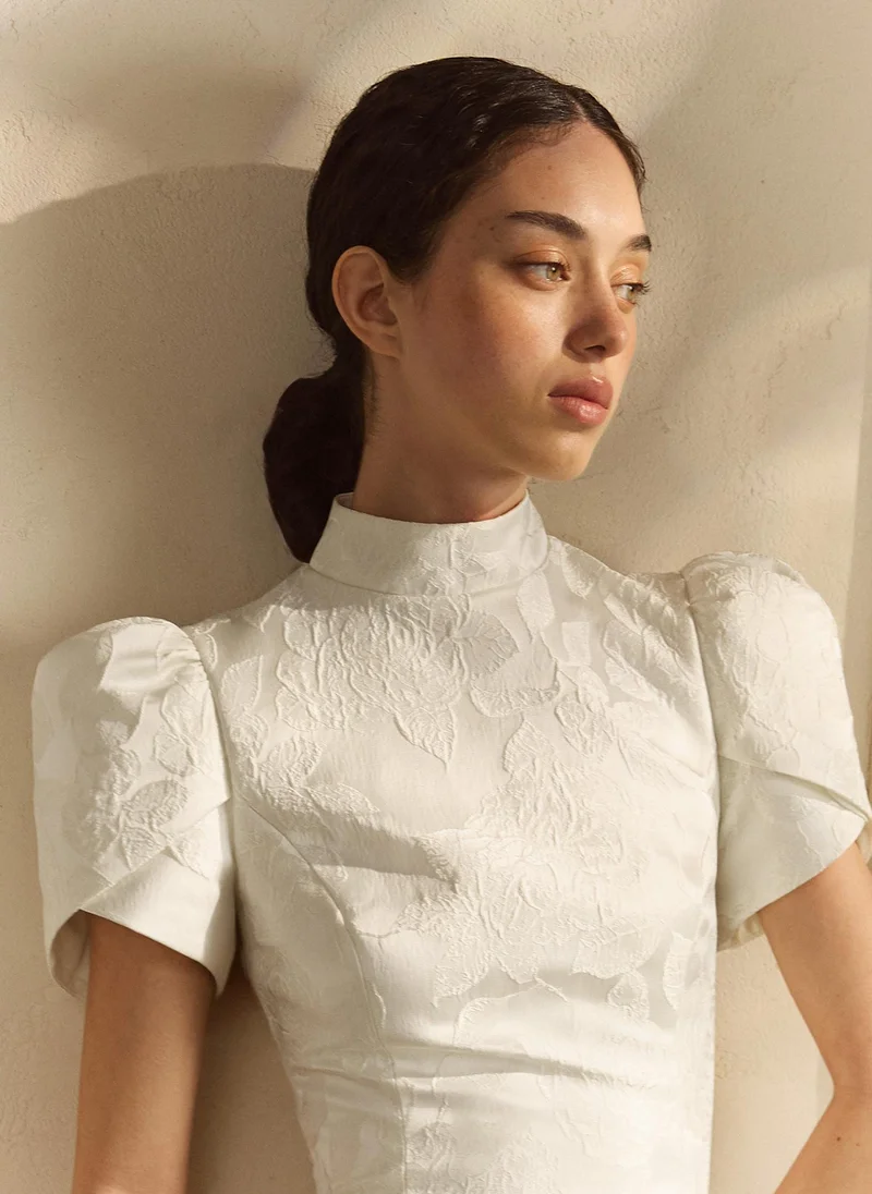 Lichi  Fitted mini dress with textured floral pattern for Women | Best Price UAE