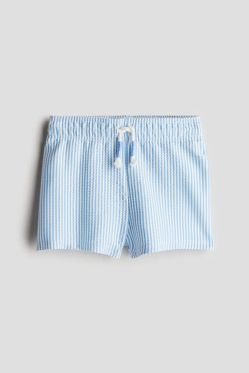 اتش اند ام Patterned swim shorts