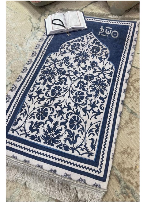 """A luxurious prayer rug with an elegant Islamic design: 1- A prayer rug lined with sponge, to absorb knee pressure during prostration, enabling you to feel comfortable during prostration. 2- A quarter-paper white Quran with the same design as the rug. 3- A rosary for tasbih after prayer. 4- A special cover for the set to be suitable for presenting as a gift. Elegant"""