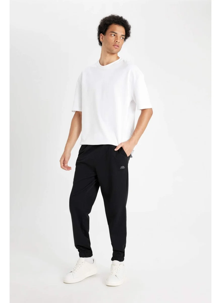 ديفاكتو Regular Fit Sweatpants with Pockets and Elastic Legs D4416AX24AU