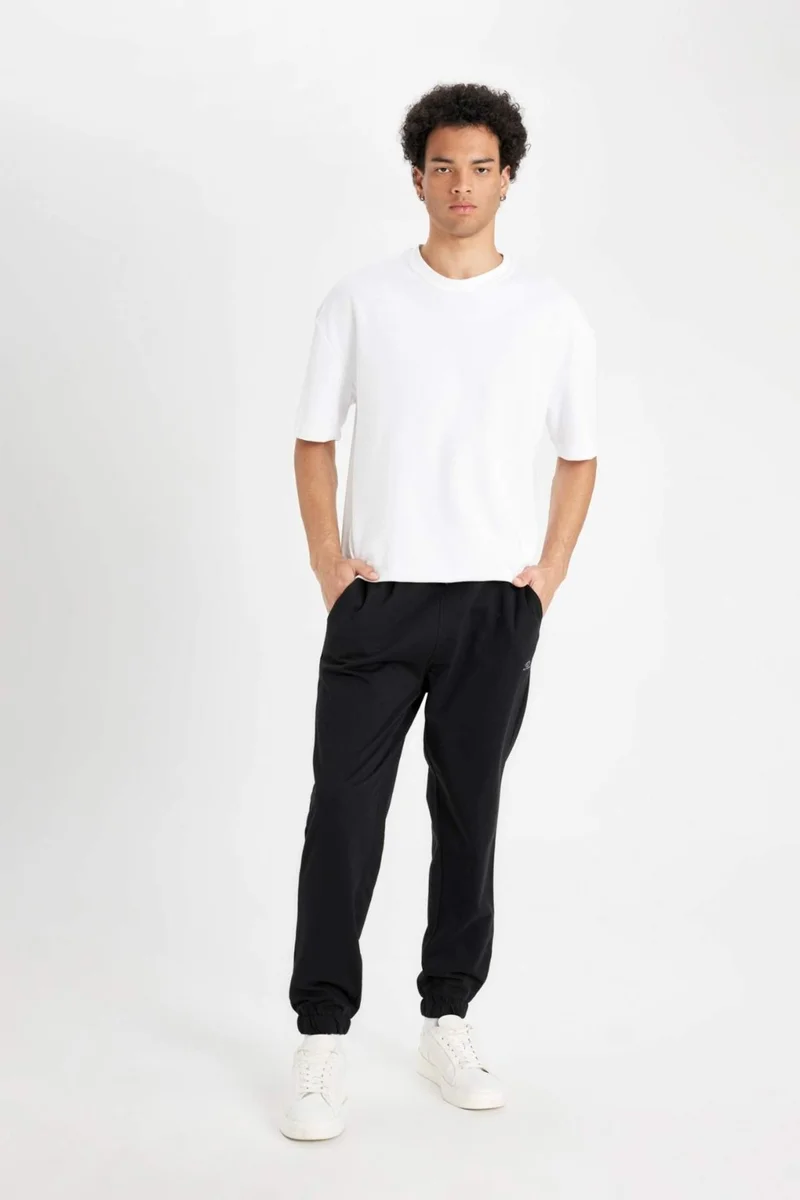DeFacto Regular Fit Sweatpants with Pockets and Elastic Legs D4416AX24AU