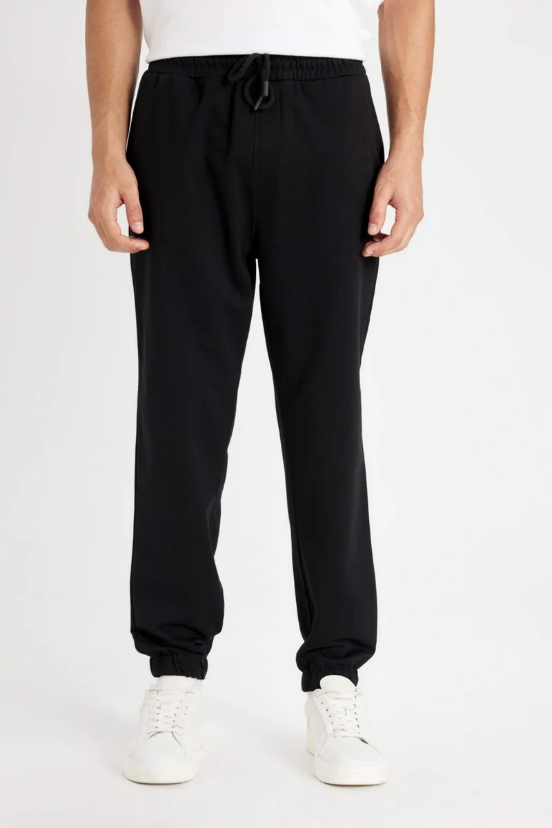DeFacto Regular Fit Sweatpants with Pockets and Elastic Legs D4416AX24AU
