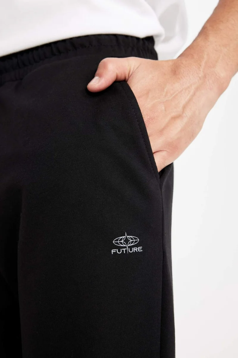 DeFacto Regular Fit Sweatpants with Pockets and Elastic Legs D4416AX24AU