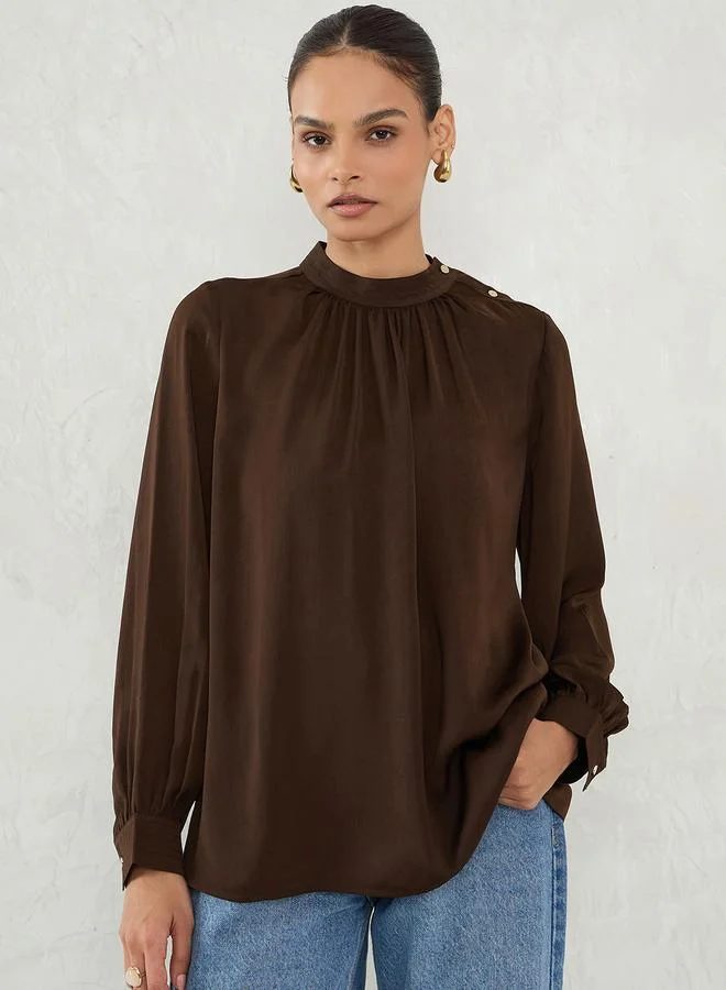فيميلا بلوزة ساتان بأكمام طويلة
