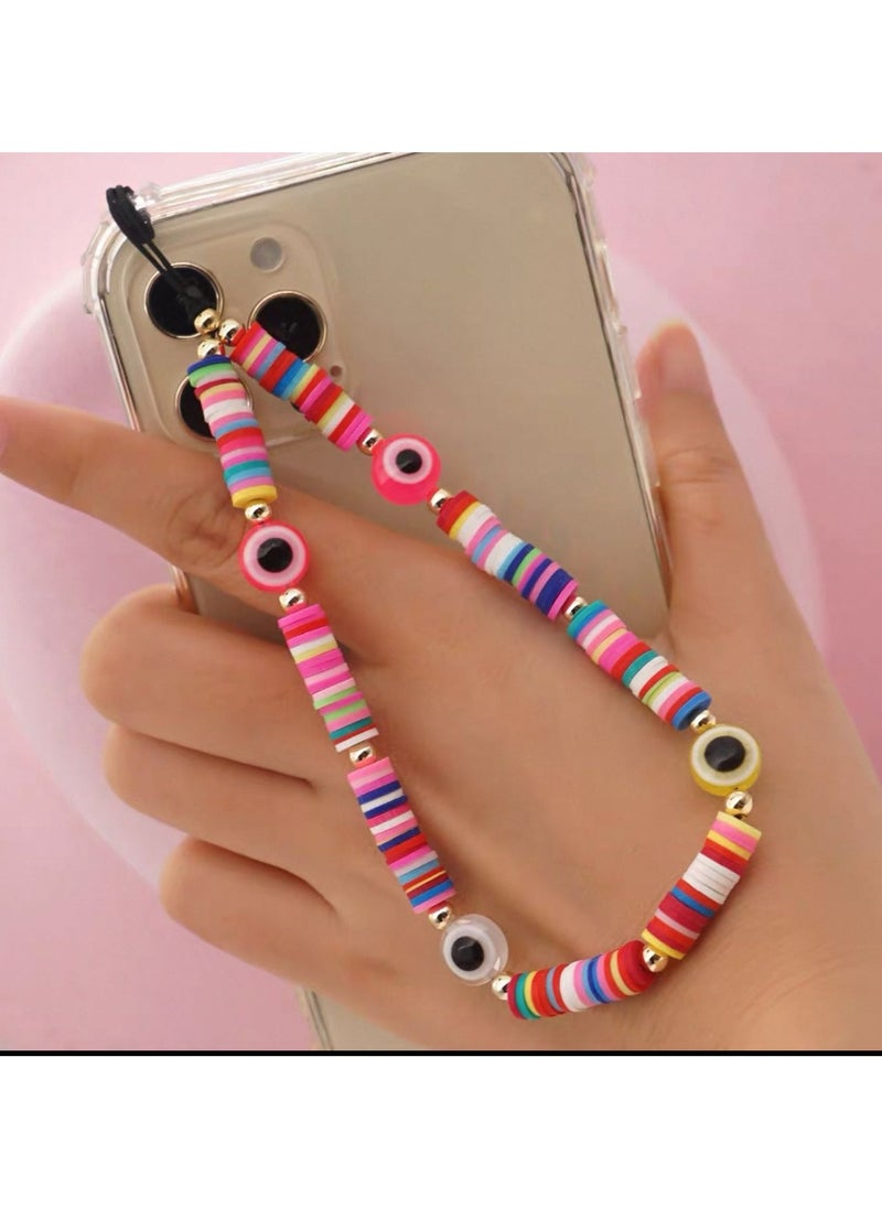 Generic - Fashionable and practical mobile phone accessories, designed to add an aesthetic touch and protect the device. They feature a unique design made up of colorful beads of various sizes and shapes, giving them a vibrant and cheerful appearance. They also provide additional protection for the phone from drops and loss. - Image 1