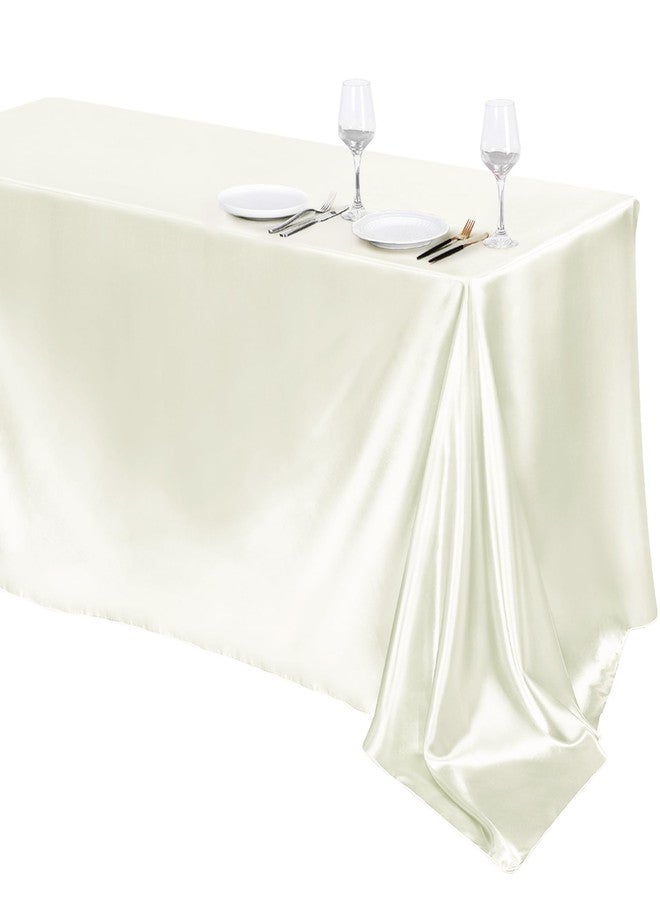 TURSTIN 1 Pack Ivory Satin Tablecloth 102 x 58 Inch Overlay Satin Table Cover Rectangle Bright Silk Tablecloth Smooth Fabric Table Decoration for Wedding Banquet Party Events - Image 1