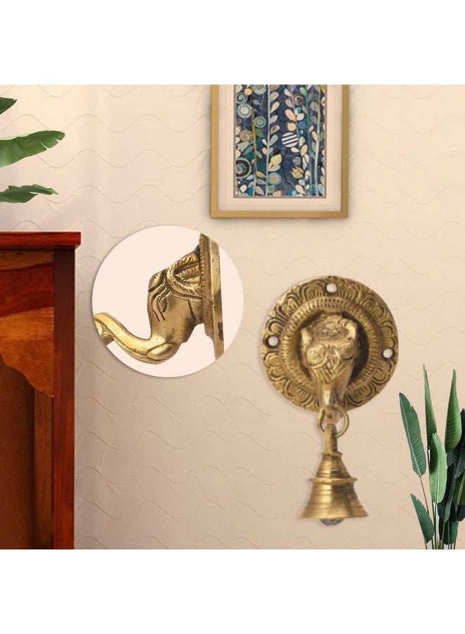 The Advitya The Advitya Elephant Trunk-Shaped Brass Door Hanging Bell | Antique Finish Ganesh Ghanti | Elephant Face Temple Bell | Wall Decoration Decorative Mandir Gate Bell | 3.3 X 3.3 Inch - Image 1