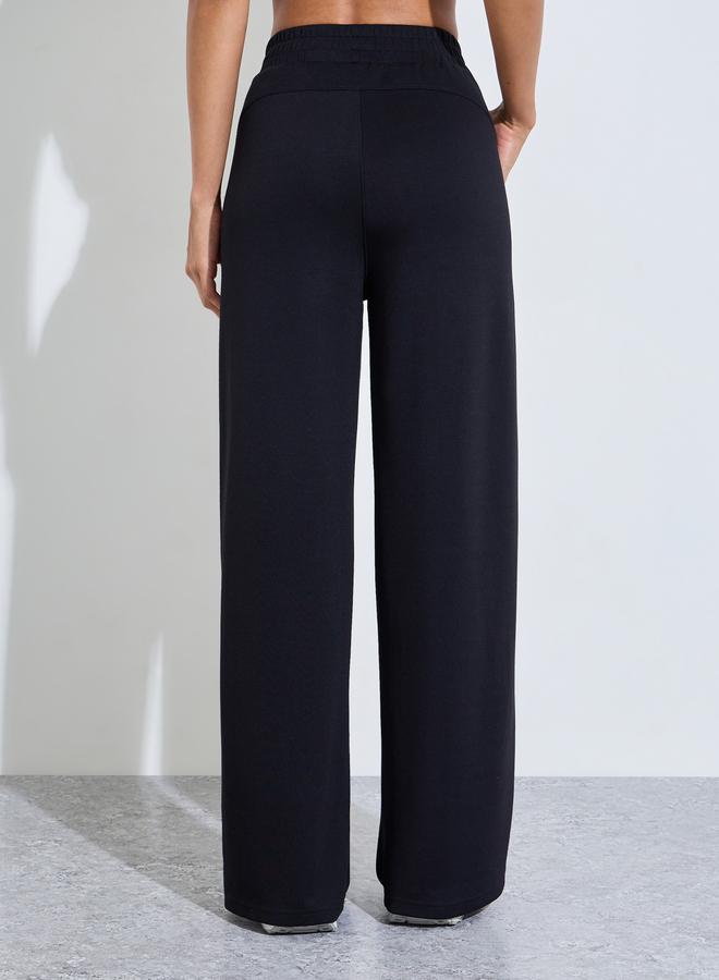 Styli Active Black Solid Wide Leg Side Slit Activewear Pants - Image 4