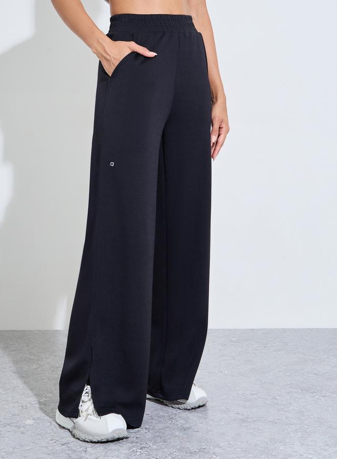 Styli Active Black Solid Wide Leg Side Slit Activewear Pants - Image 1