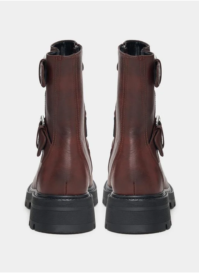 RAID Side Buckle Accent Biker Ankle Boots by Styli