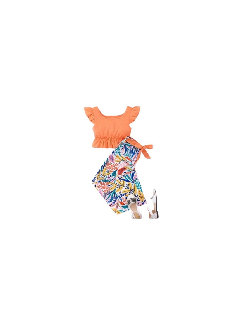 Girls' set consisting of an orange T-shirt and floral pants 