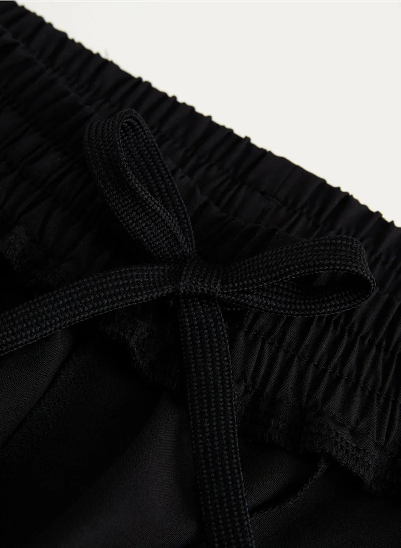 GIORDANO  Women’s Mid-Rise Loose Fit Elastic Waist Pants | Online Exclusive for Women | Best Price UAE