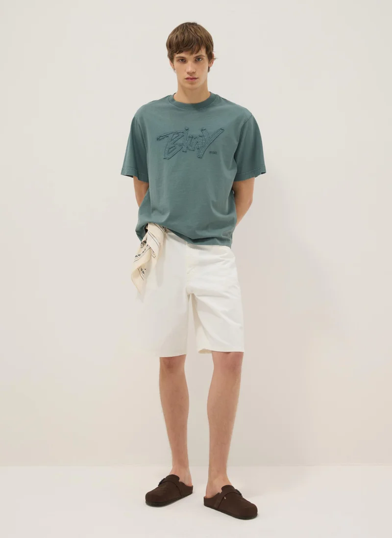 او في اس OVS Baggy White Cotton Shorts