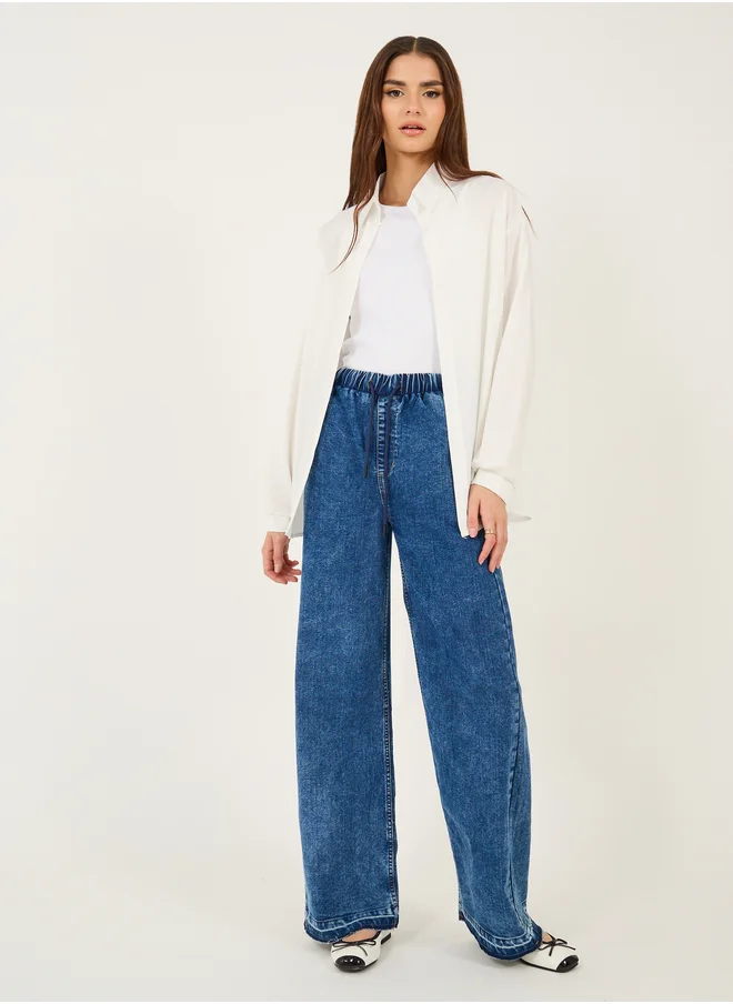 Styli High Rise Elasticated Waist Wide Leg Jeans with Frayed Hem