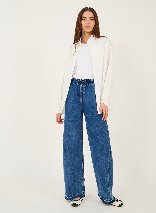 Styli High Rise Elasticated Waist Wide Leg Jeans with Frayed Hem  - Image 1
