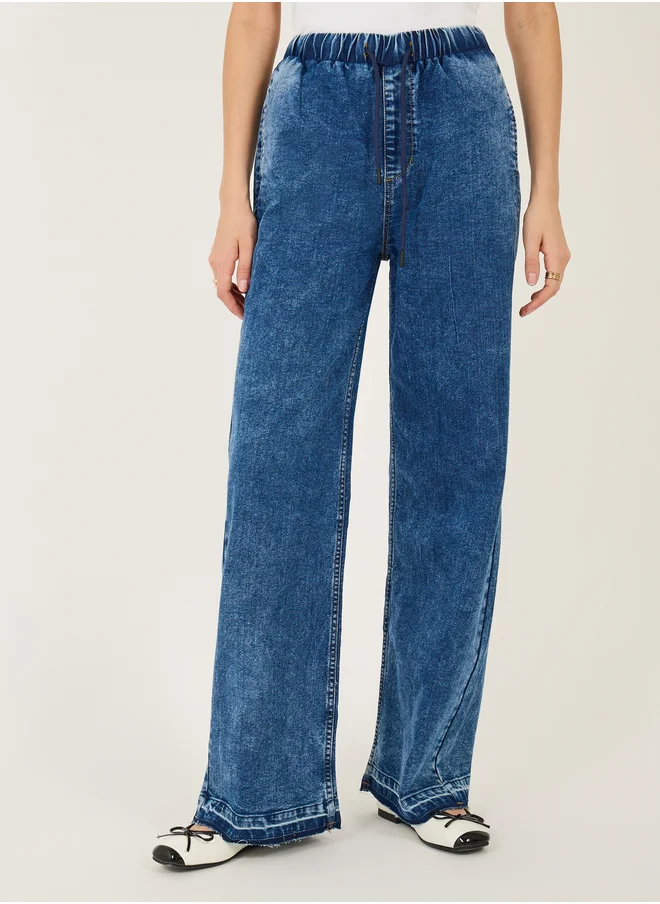 Styli High Rise Elasticated Waist Wide Leg Jeans with Frayed Hem