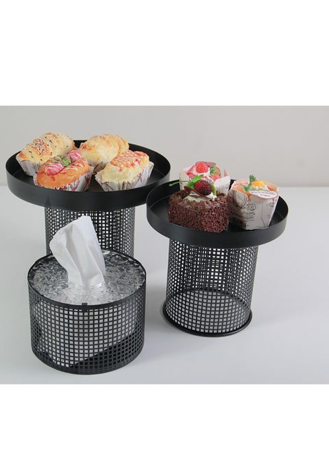 A carrier for sweets, cupcakes, nuts, and a box of tissues.