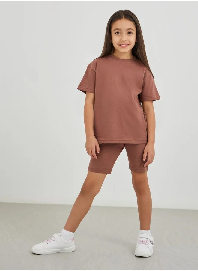 Styli Styli Solid Oversized T-Shirt with Cycle Shorts Set