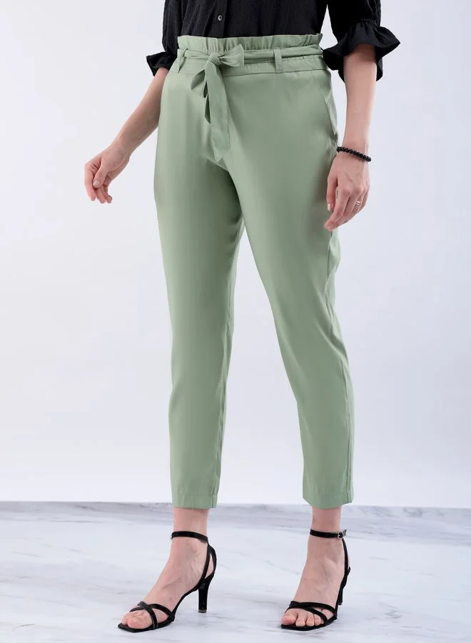 مرفوعة Women Slim Fit Solid Mid-Rise Elasticated Ruffle Waist Trousers