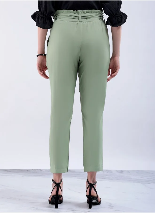 مرفوعة Women Slim Fit Solid Mid-Rise Elasticated Ruffle Waist Trousers