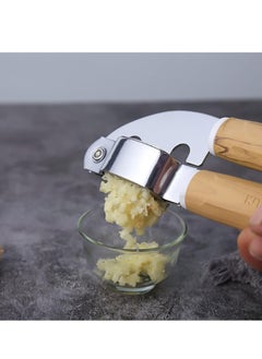 Generic Stainless steel garlic press with wooden handle  - Image 3
