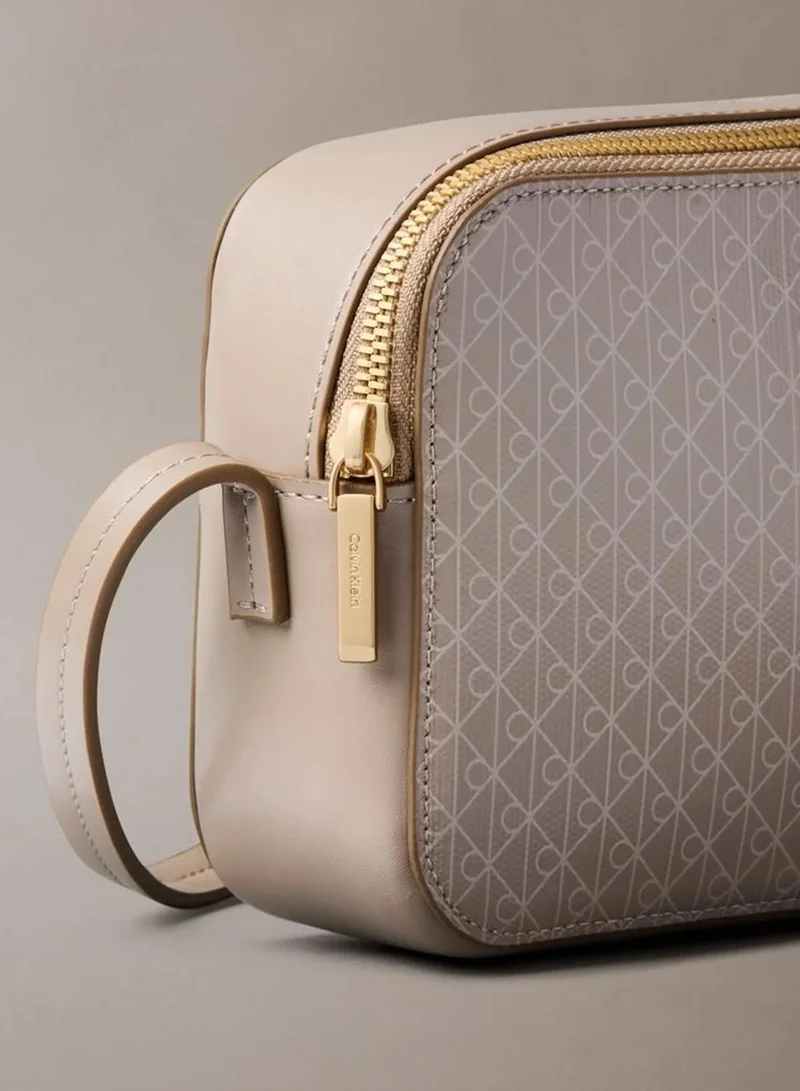 Calvin Klein DESERT TAUPE AOP Allover Monogram Logo Camera Bag for Women | Best Price UAE