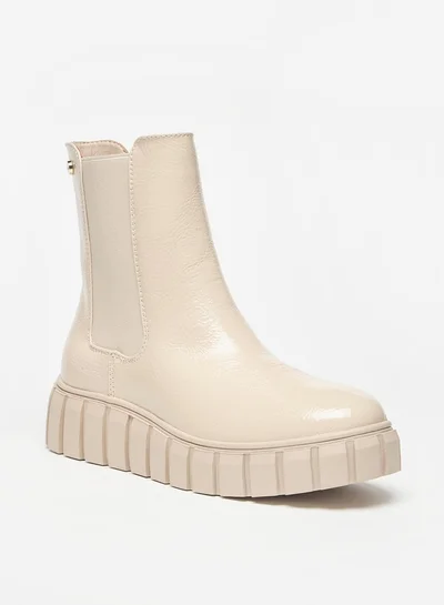 Celeste Women's Solid Slip-On Flatform Boots