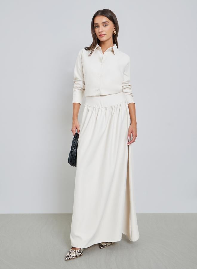 ستايلي طقم منسق من قميص سادة وتنورة طويلة - Image 1