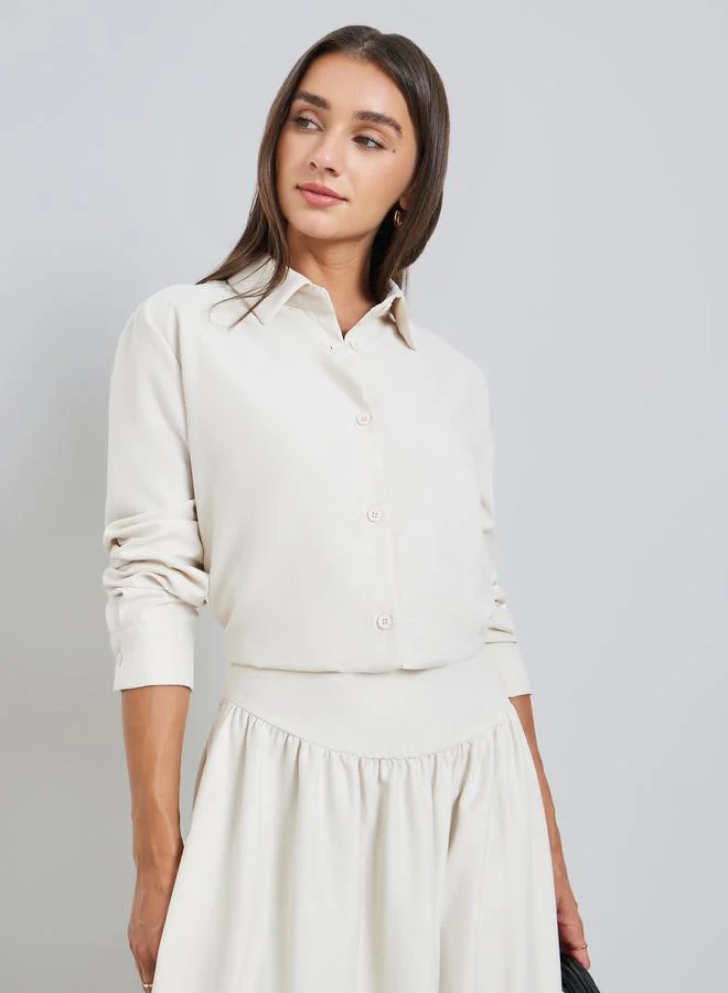 ستايلي طقم منسق من قميص سادة وتنورة طويلة