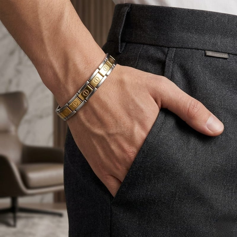 A luxurious men's bracelet made of rust-resistant stainless steel, with a two-tone ring design; the gold parts shine with a finely engraved nail pattern that gives an elegant look. - Image 2