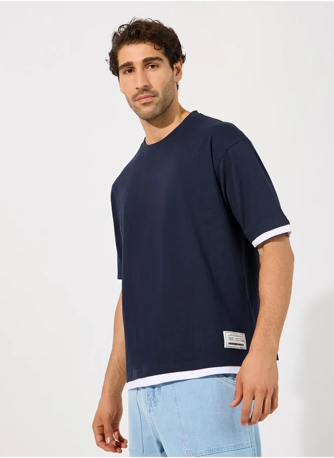 Styli Contrast Panel Oversized T-Shirt with Badge Detail
