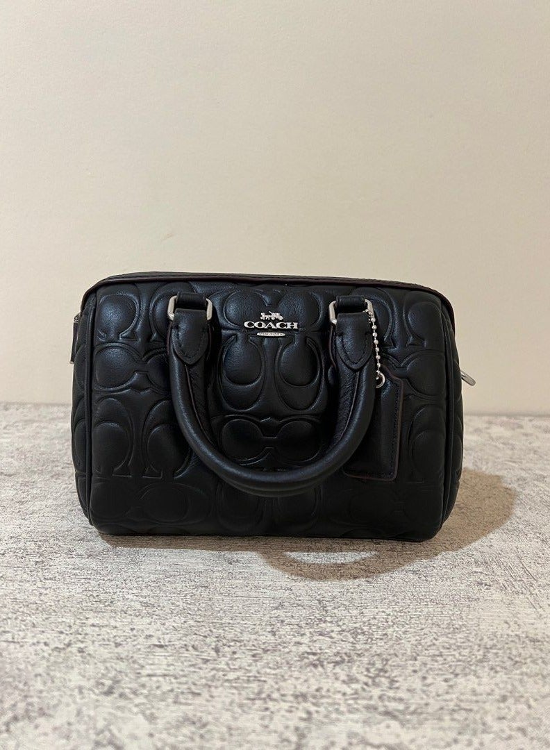 coachoutlet Mini Rowan Crossbody Bag In Blocked Signature Leather - Image 1