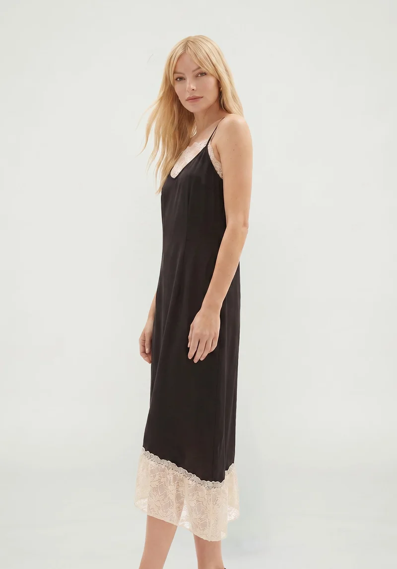 ليلي وليونيل Abby Lace Insert Midi Dress in Black and White
