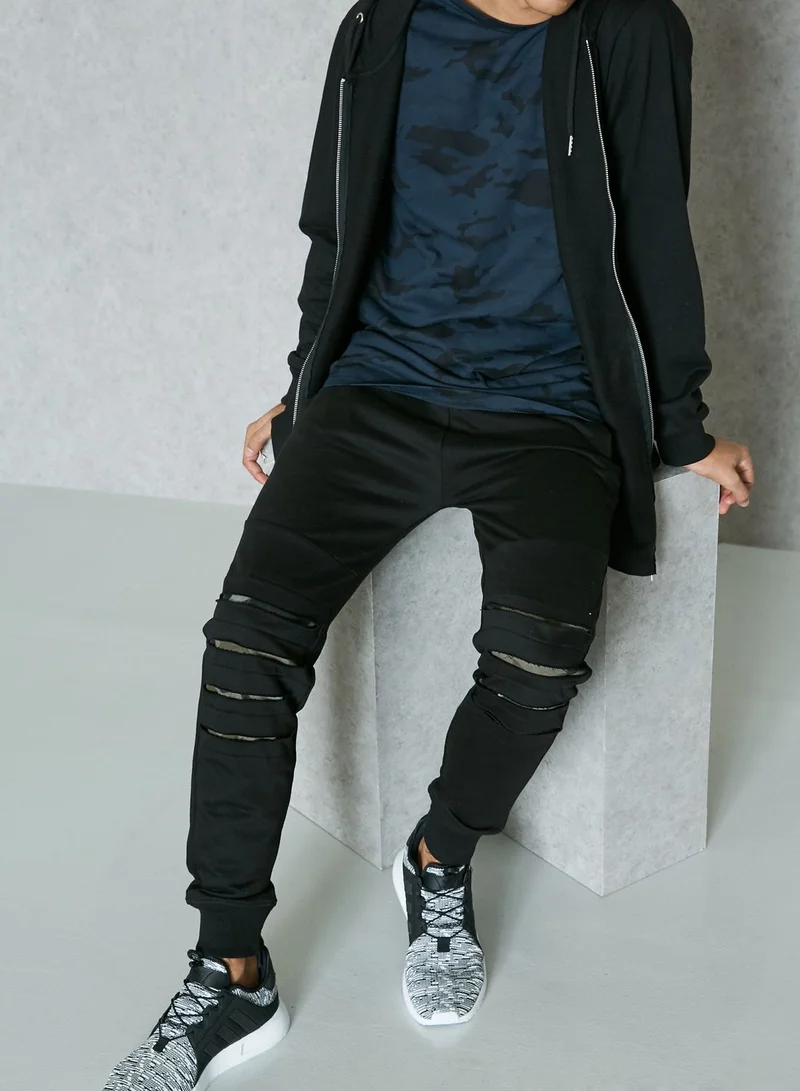 Seventy Five Ripped Knee Camo Sweatpants