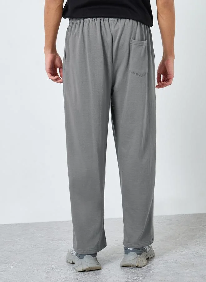 Styli Pintuck Wide Leg Terry Joggers with Badge Detail
