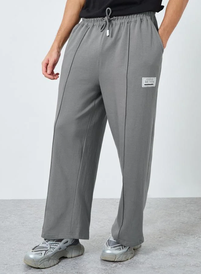 Pintuck Wide Leg Terry Joggers with Badge Detail