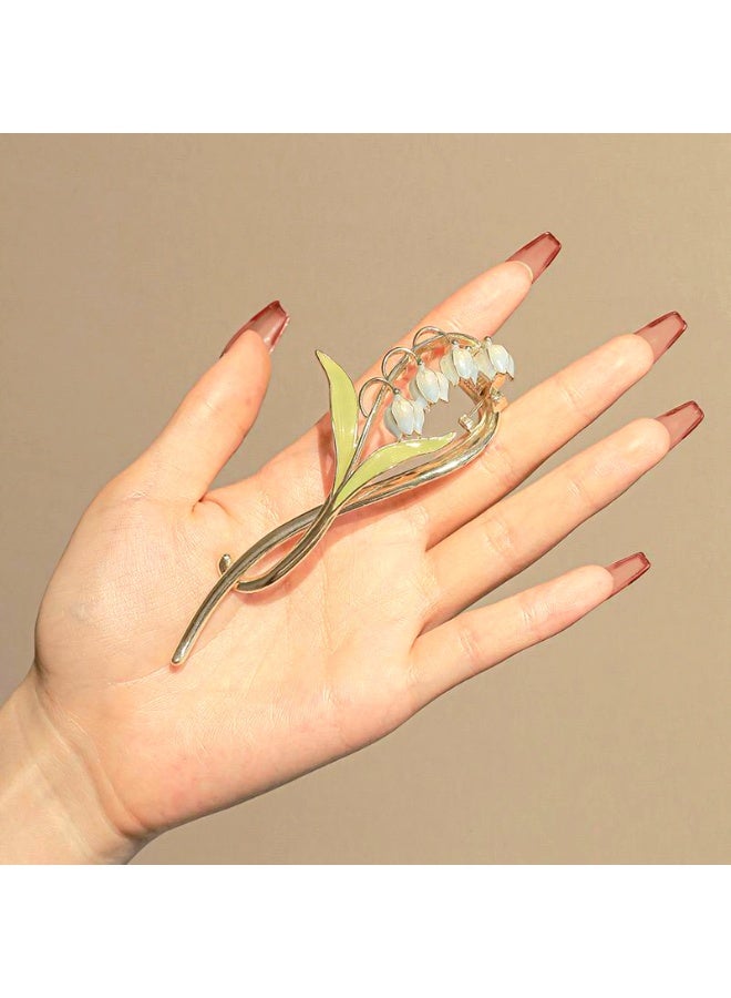 مشبك شعر معدني ازرق تصميم زهرة - Image 4