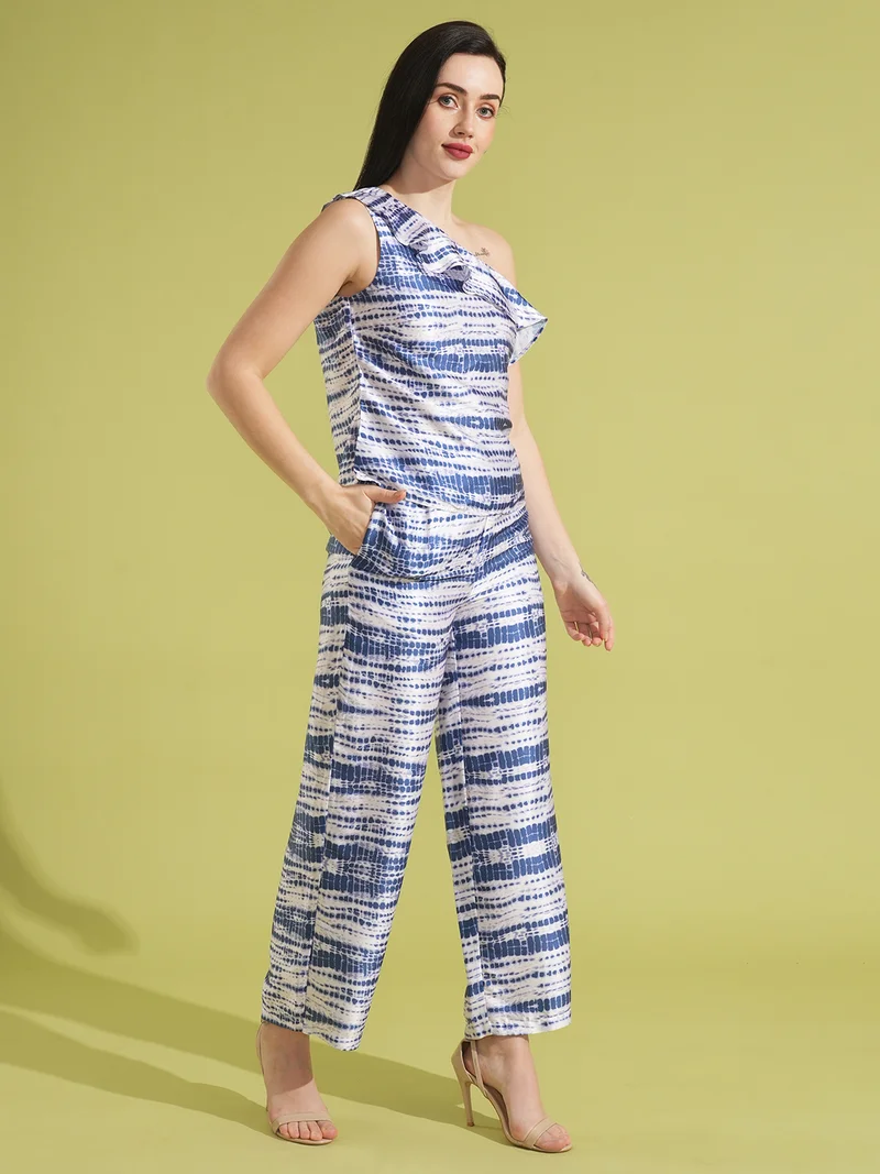 جلو باص بلوزة بكتف واحد بطبعة تجريدية مع بنطلون نسائي من جلوبس