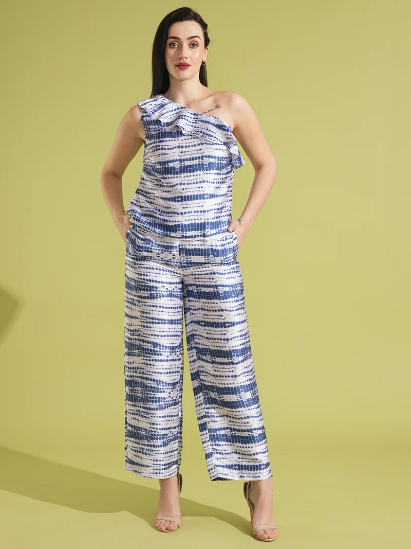 جلو باص بلوزة بكتف واحد بطبعة تجريدية مع بنطلون نسائي من جلوبس