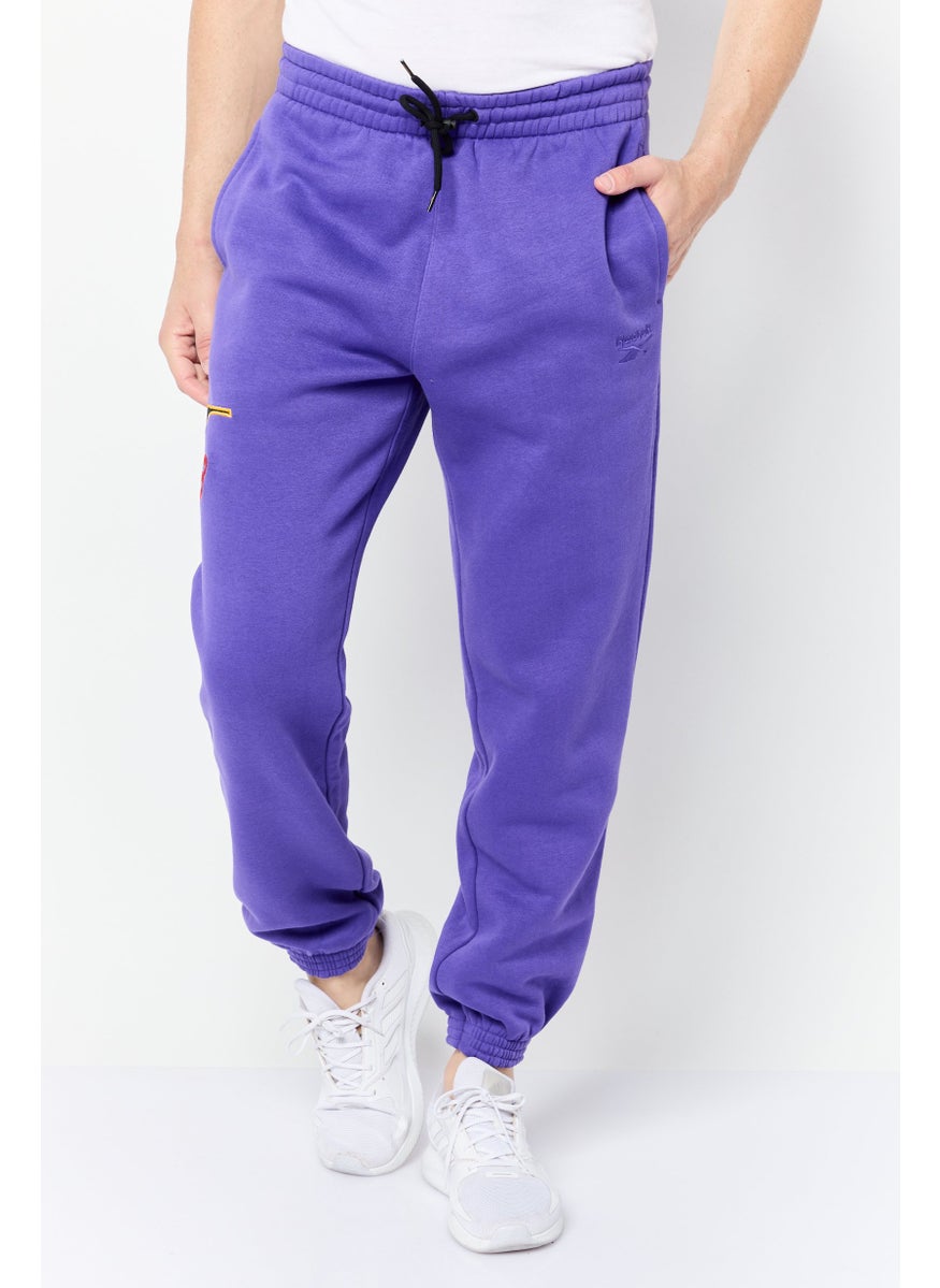 Reebok Men Sportswear Fit Outdoor Sweatpants, Purple  - Image 1