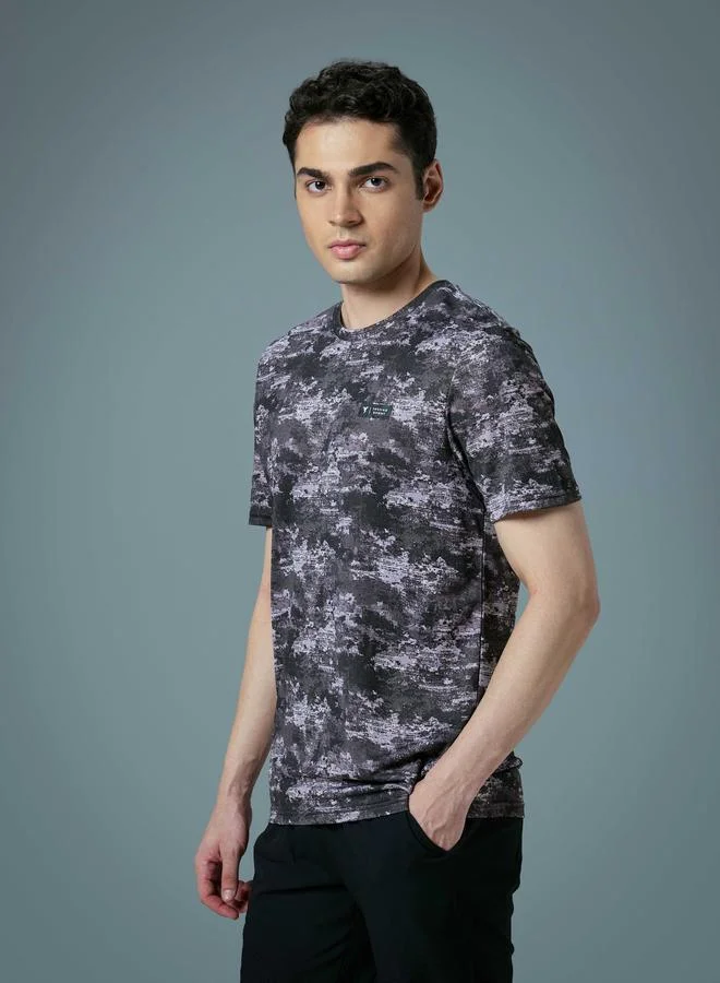 تكنوسبورت تيشيرت رجالي مطبوع بالكامل بقصة ضيقة من تكنوسبورت