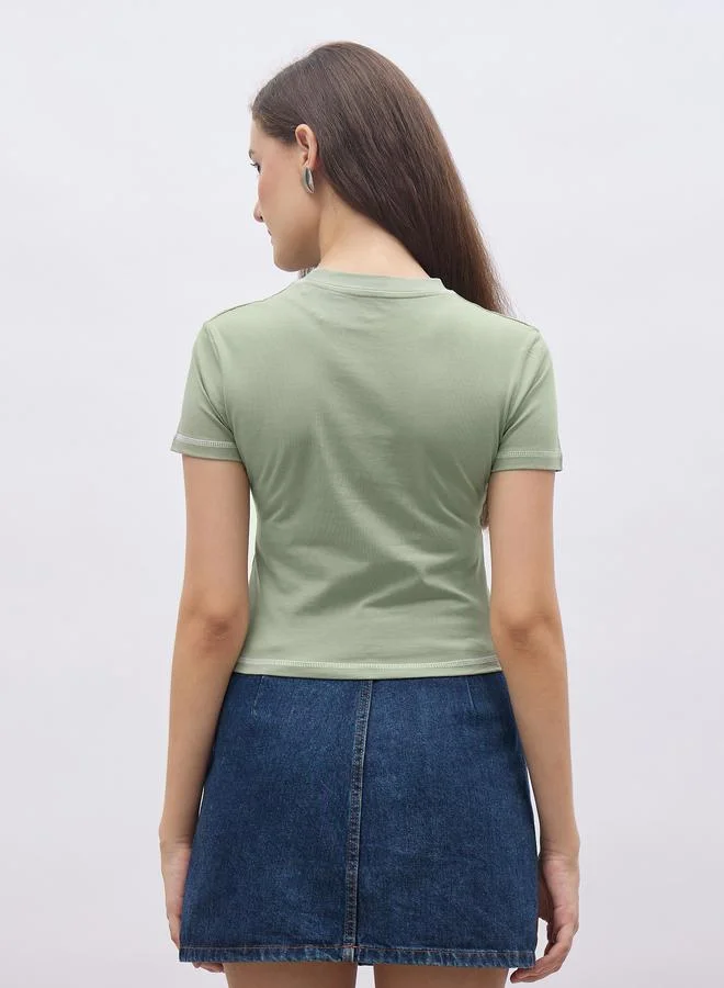 Styli Styli Green Slogan Print T-Shirt with Overlock Seam