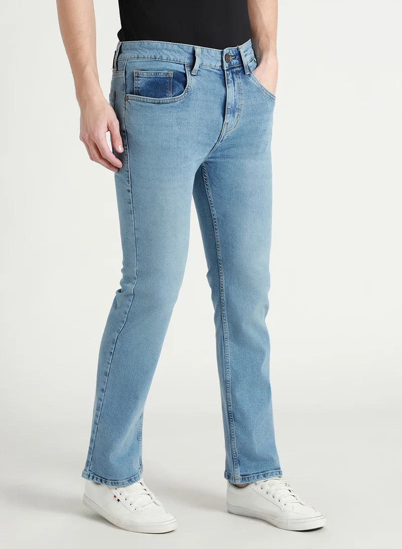 دينيس لينغو جينز رجالي بقصة واسعة من القطن الخالص باللون الأزرق المتوسط